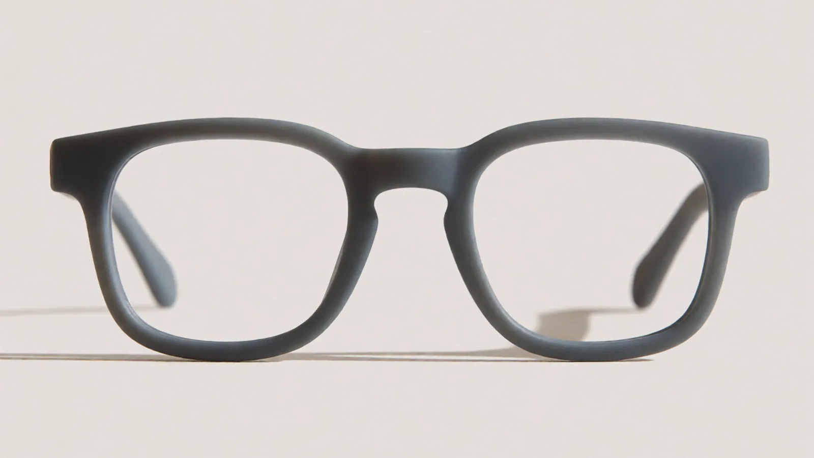 The front of the slate flexible nylon square frame, photographed straight on against pale grey stone.
